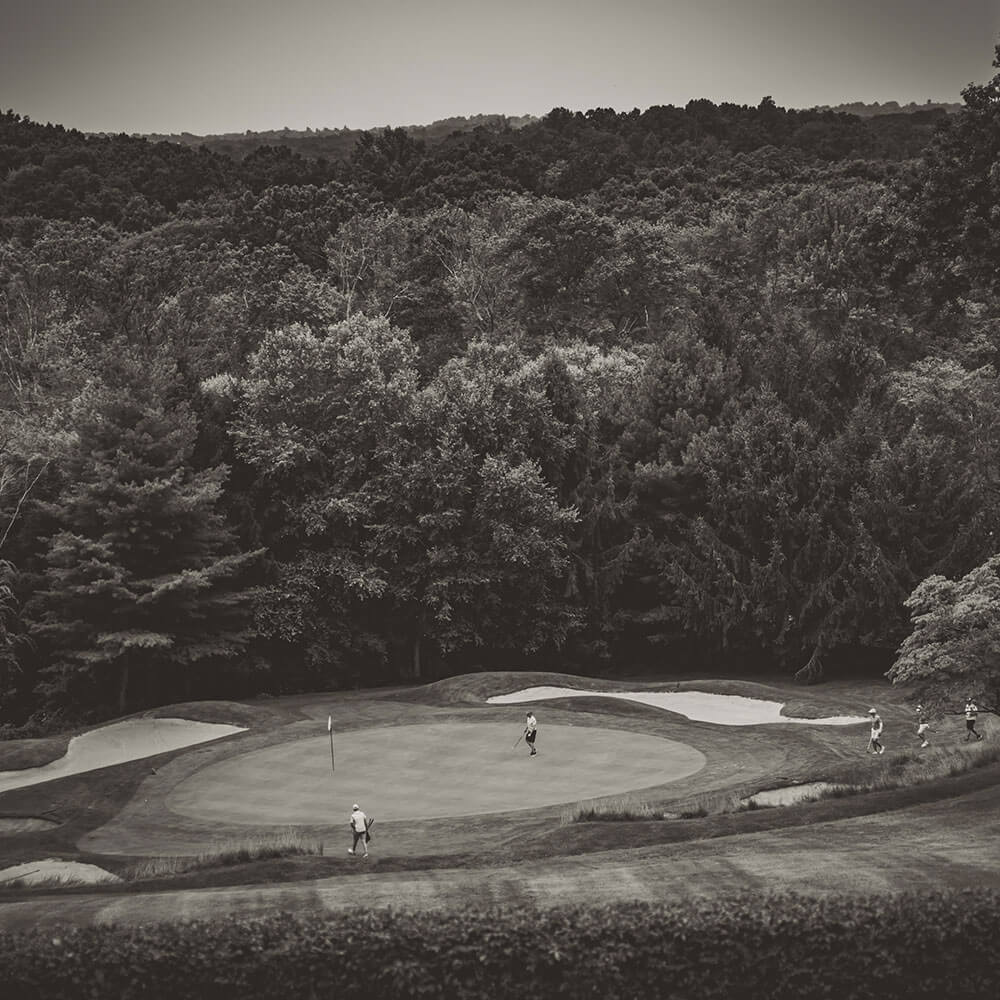 black and white image of golf course